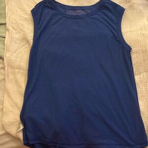 Workout top with mess and tail details in back.